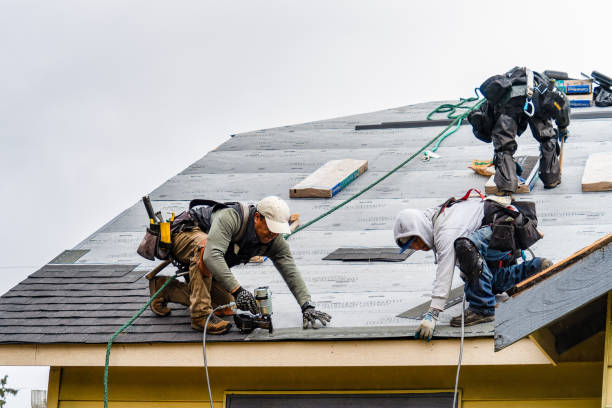 Professional Gutter Installation technician working in Bushwood, MD